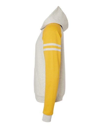 JERZEES Unisex Nublend® Varsity Colorblocked Raglan Hooded Sweatshirt 97CR #color_Oatmeal Heather/ Mustard Heather